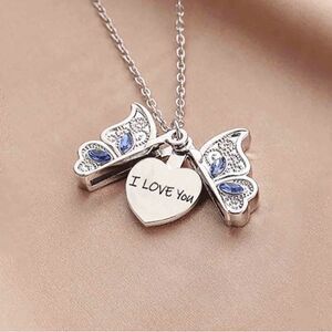 NWOT … Butterfly Locket With “I Love You” Hidden Message